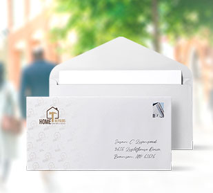 Custom branded and addressed envelope with second envelope opened and letter peeking out